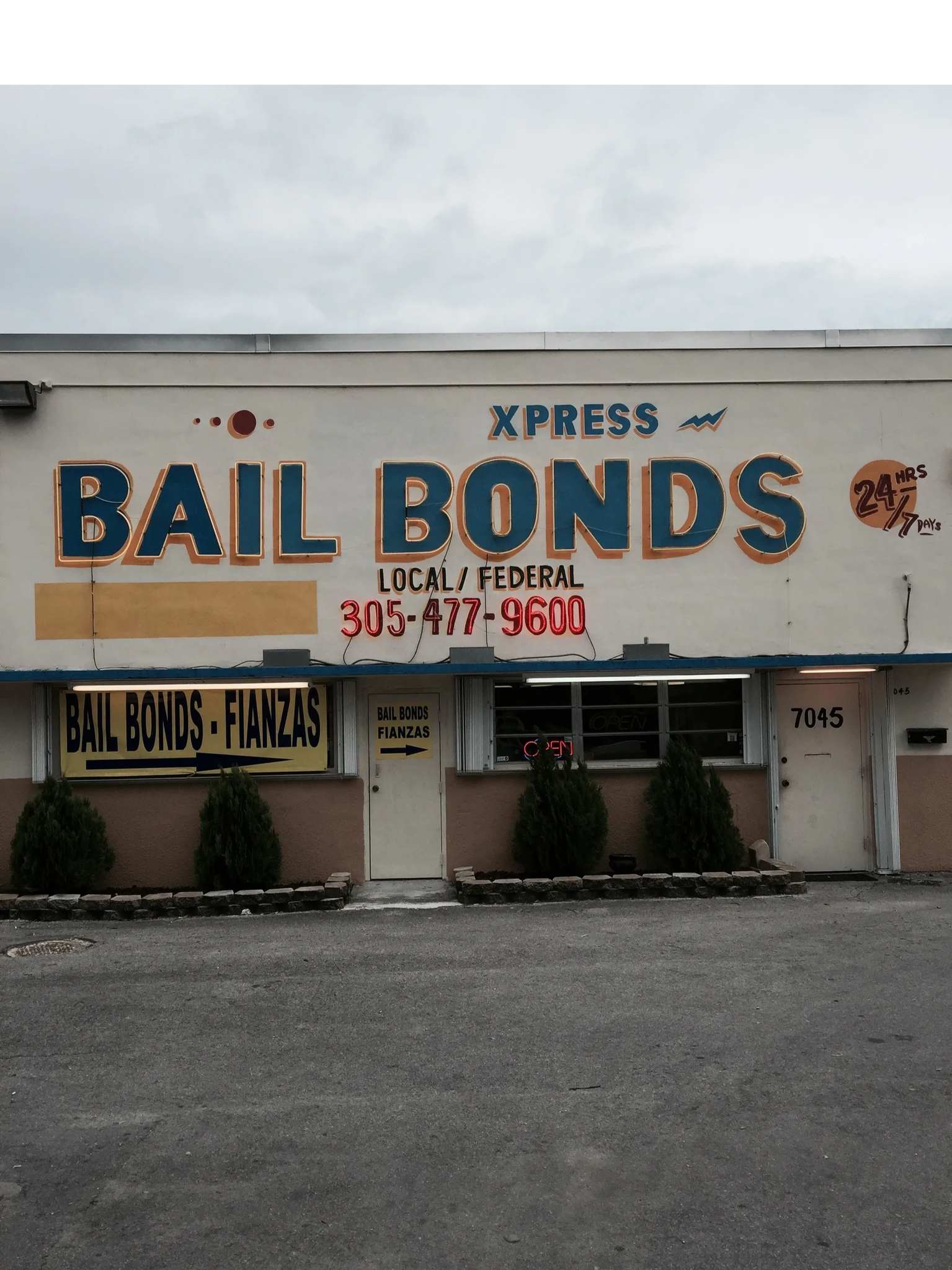 Xpress Bail Bonds storefront by day — XPRESS BAIL BONDS, Local / Federal, 305-477-9600, Bail Bonds · Fianzas, open 24 hours 7 days, 7045 NW 41 Street